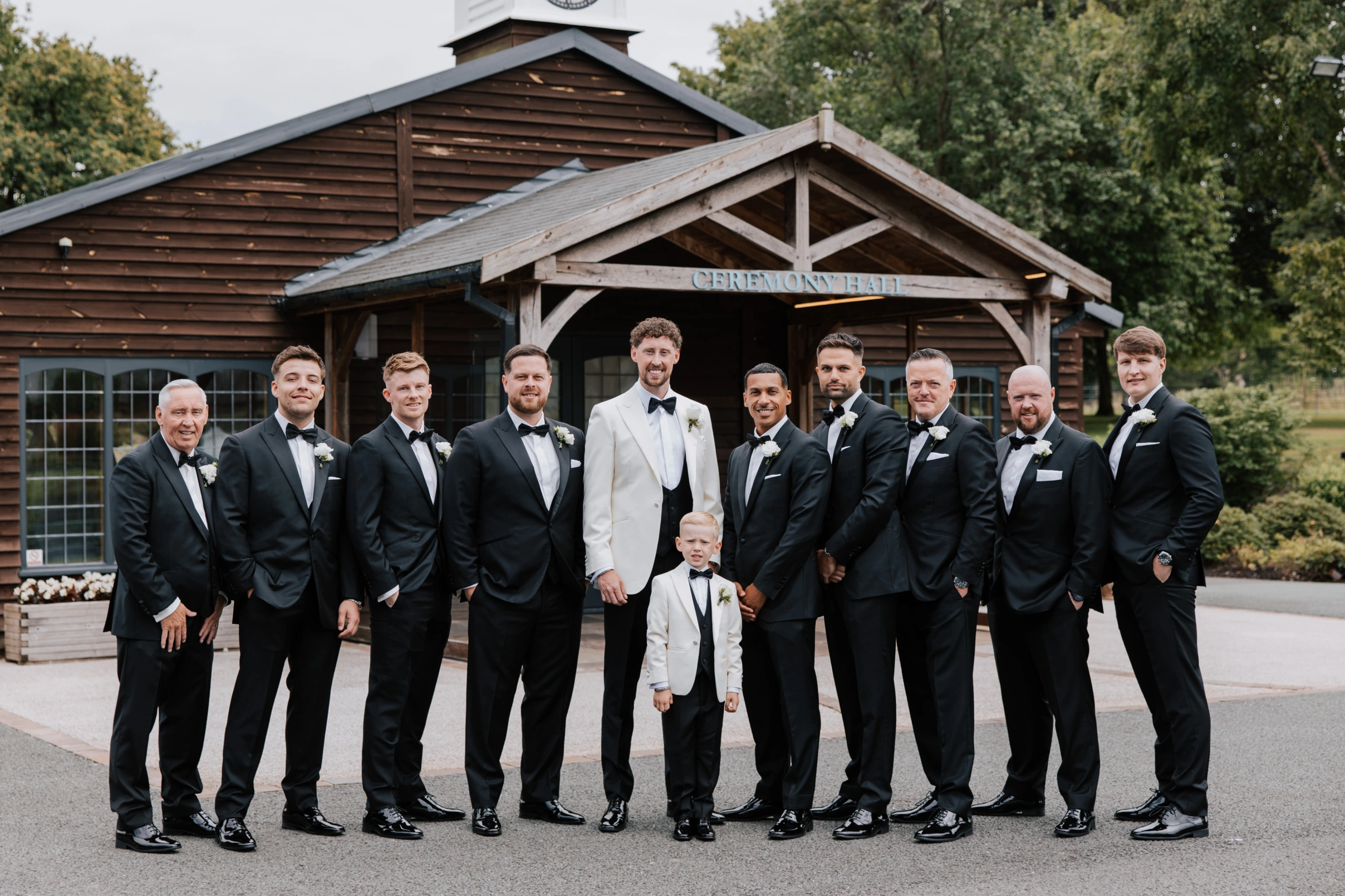 Joe with his groomsmen outside the ceremony hall