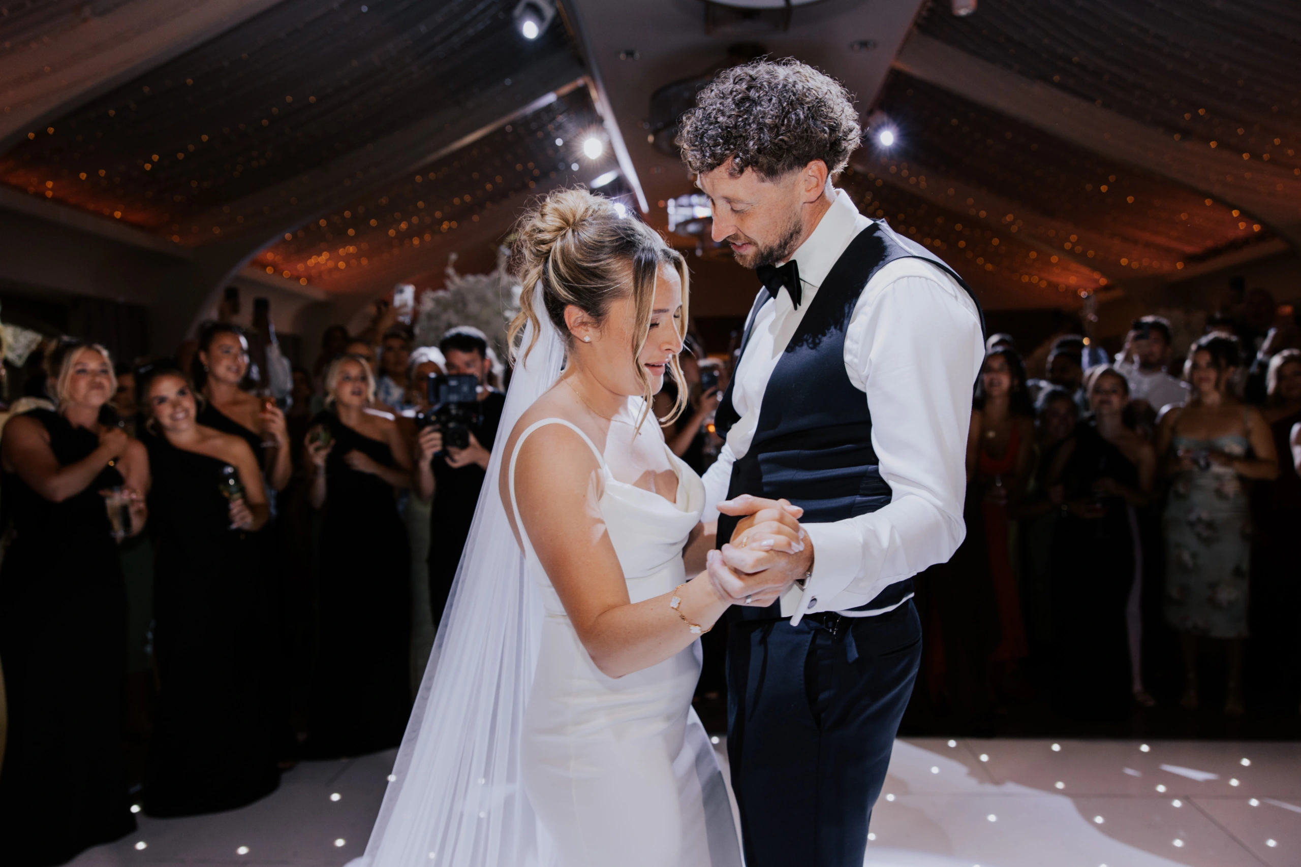 Joe and Ella sharing their first dance