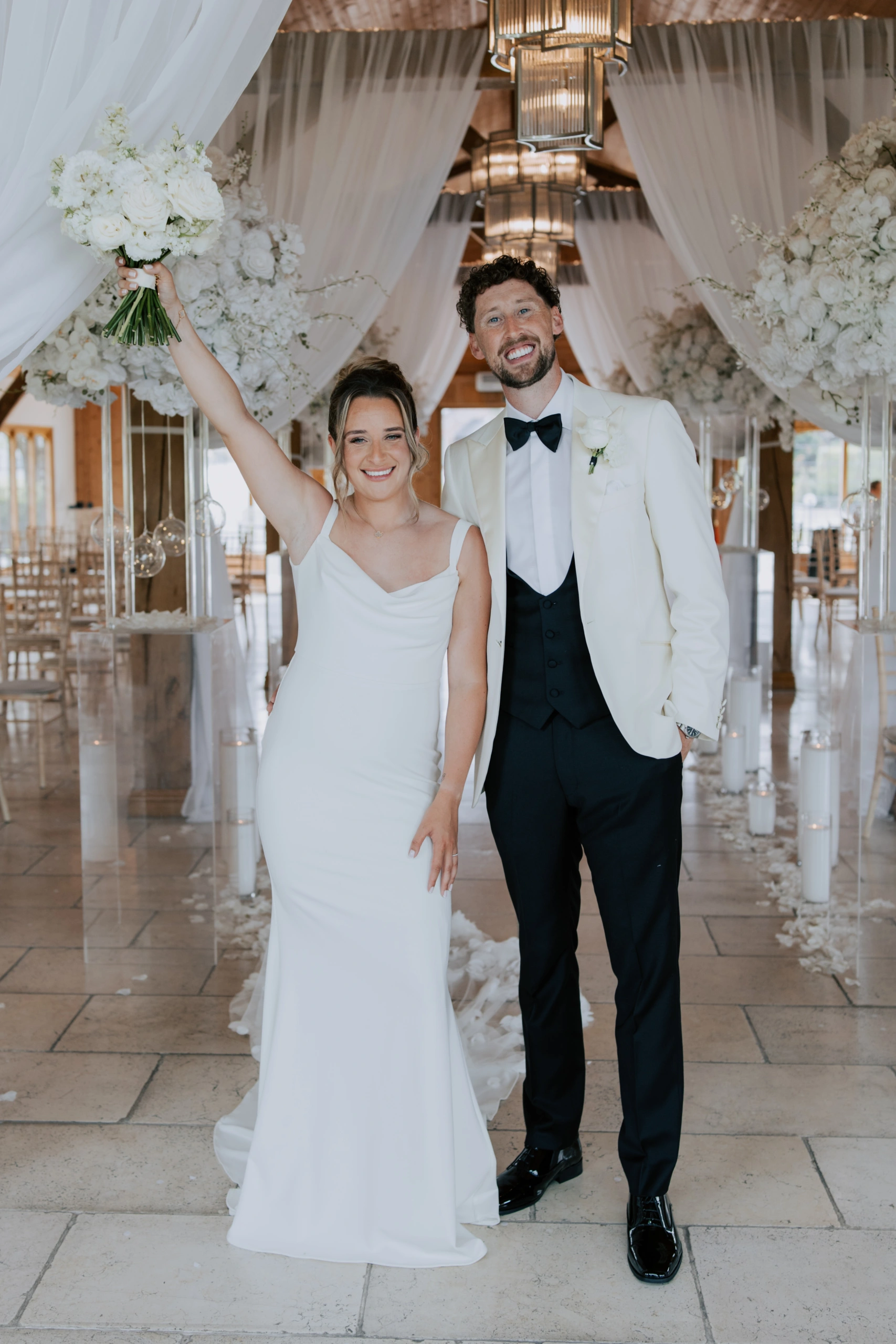 Joe and Ella celebrating after their ceremony